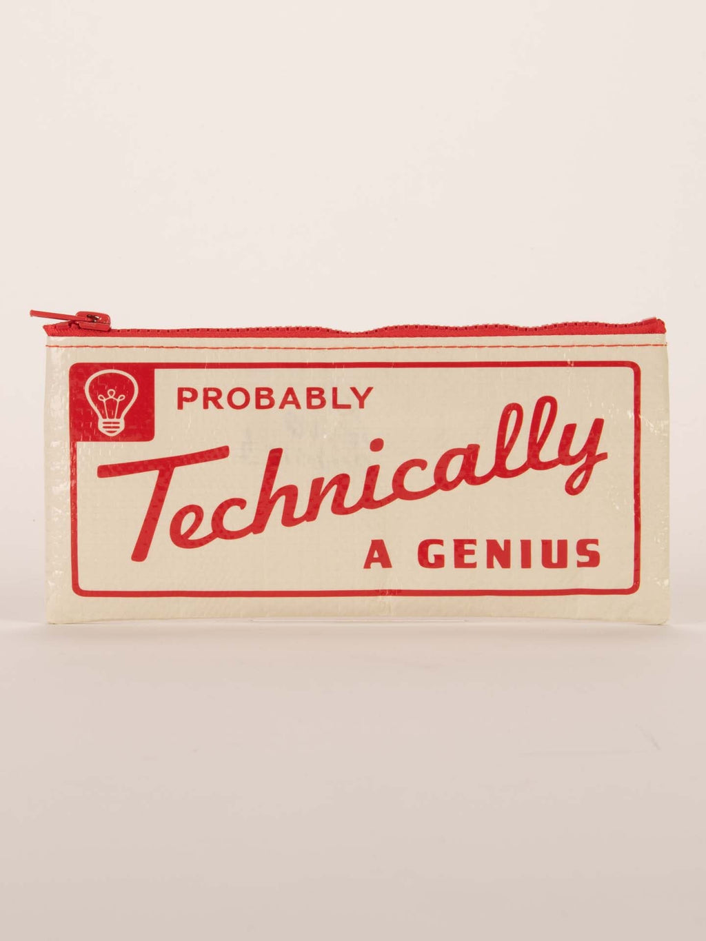 The Blue Q "Probably Technically A Genius" Pencil Case is a cream-colored zippered pouch with red trim, featuring bold red lettering and a lightbulb graphic—ideal for anyone who’s smart and proud of it.