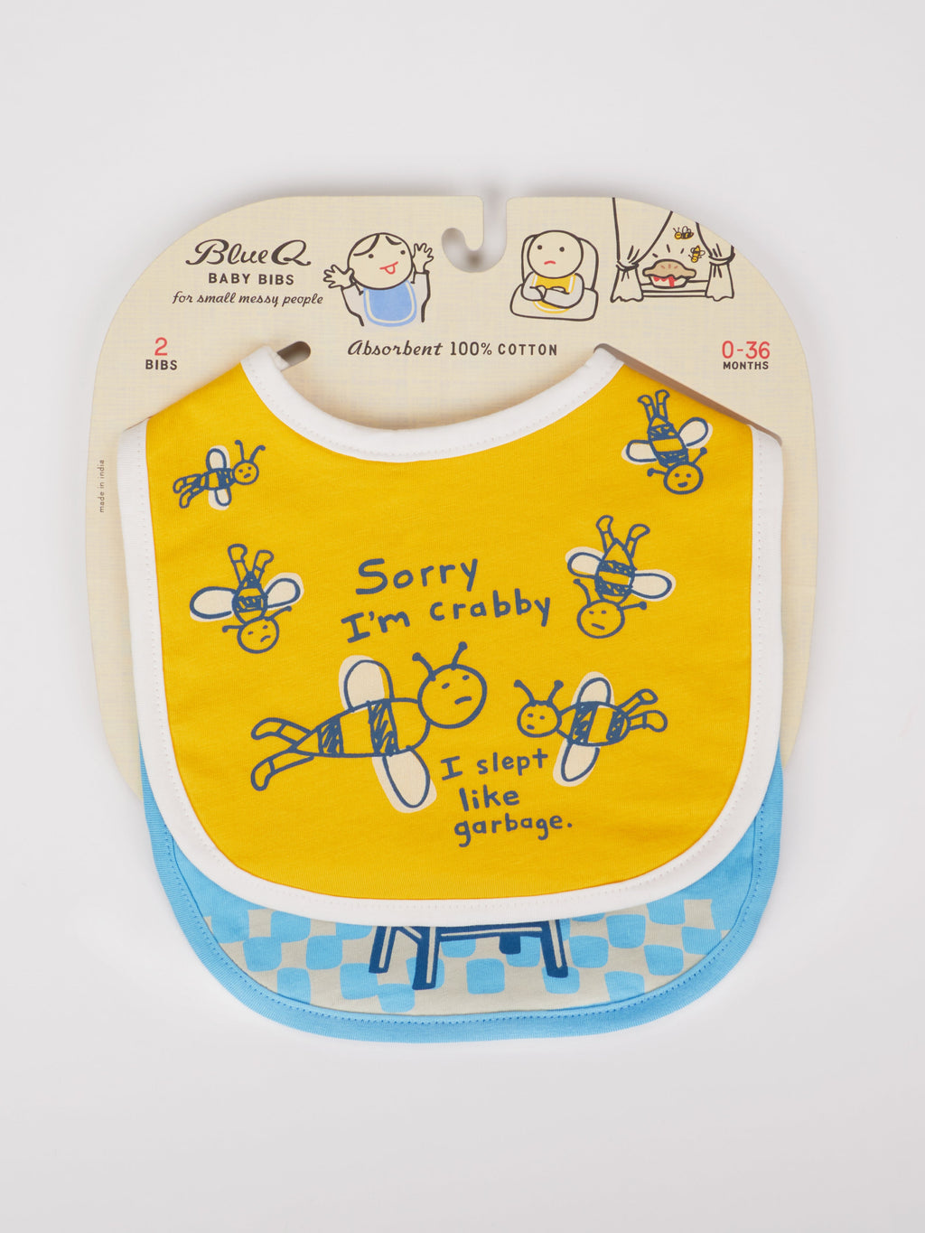 Blue Q’s “Sorry I’m Crabby. I Slept Like Garbage.”/Lunch Chucker Bibs set includes a yellow cotton bib with cartoon bees and a funny quote, plus a blue terry bib with tray design. Both come in packaging and fit ages 0–36 months.