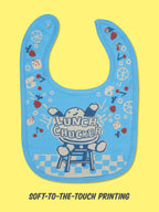 The Blue Q "Sorry I'm Crabby. I Slept Like Garbage./ Lunch Chucker Bib" is a soft cotton terry bib with playful food graphics and a cartoon crab holding a Lunch Chucker sign, yellow background, and soft-to-the-touch printing.