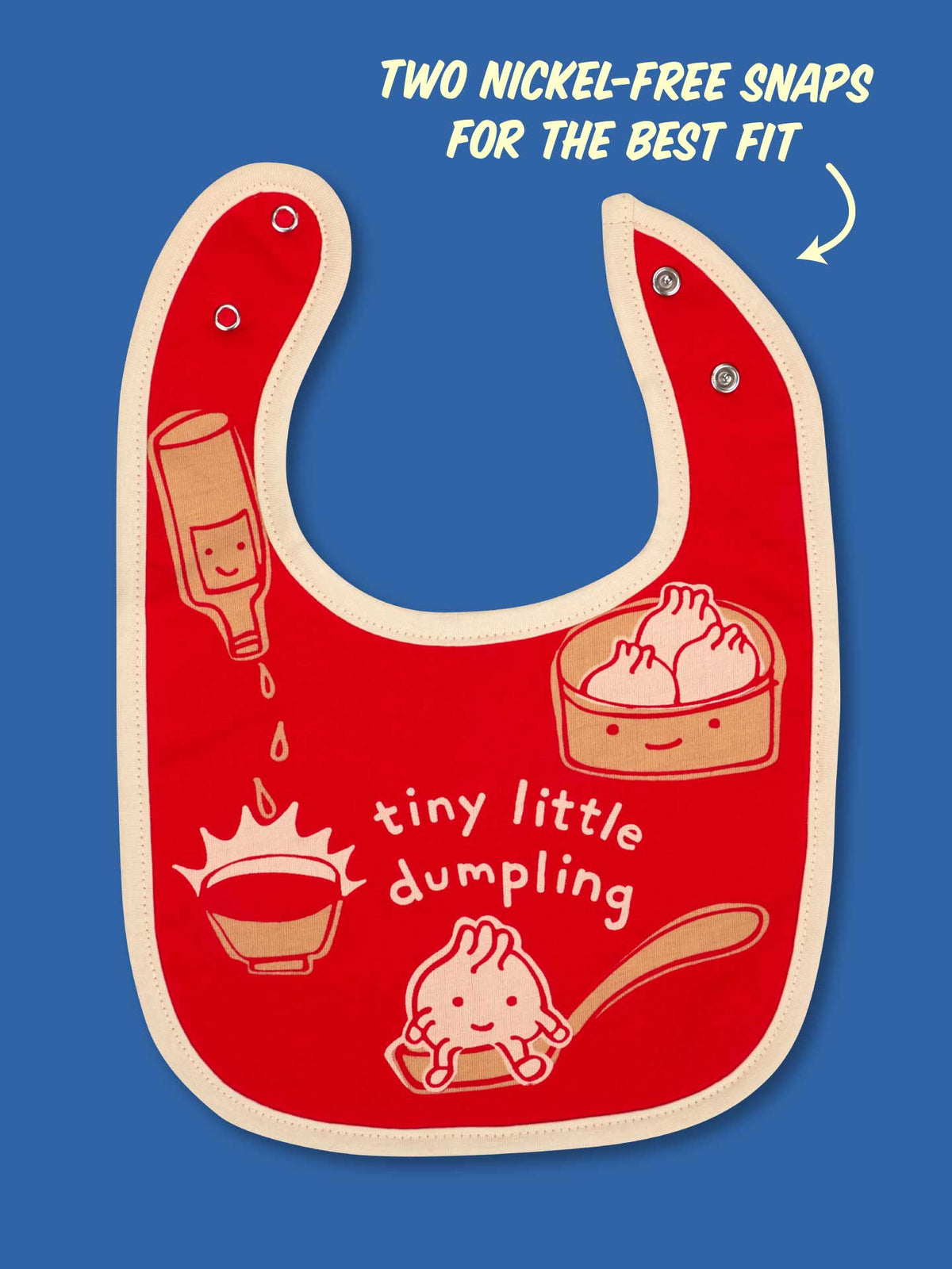 The Blue Q Tiny Little Dumpling/Wanna Join Me For A Meltdown? Baby Bib is a red cotton bib with cream trim, cute dumplings and soy sauce, absorbent terry back, "tiny little dumpling" text, and two nickel-free snaps for the best fit.