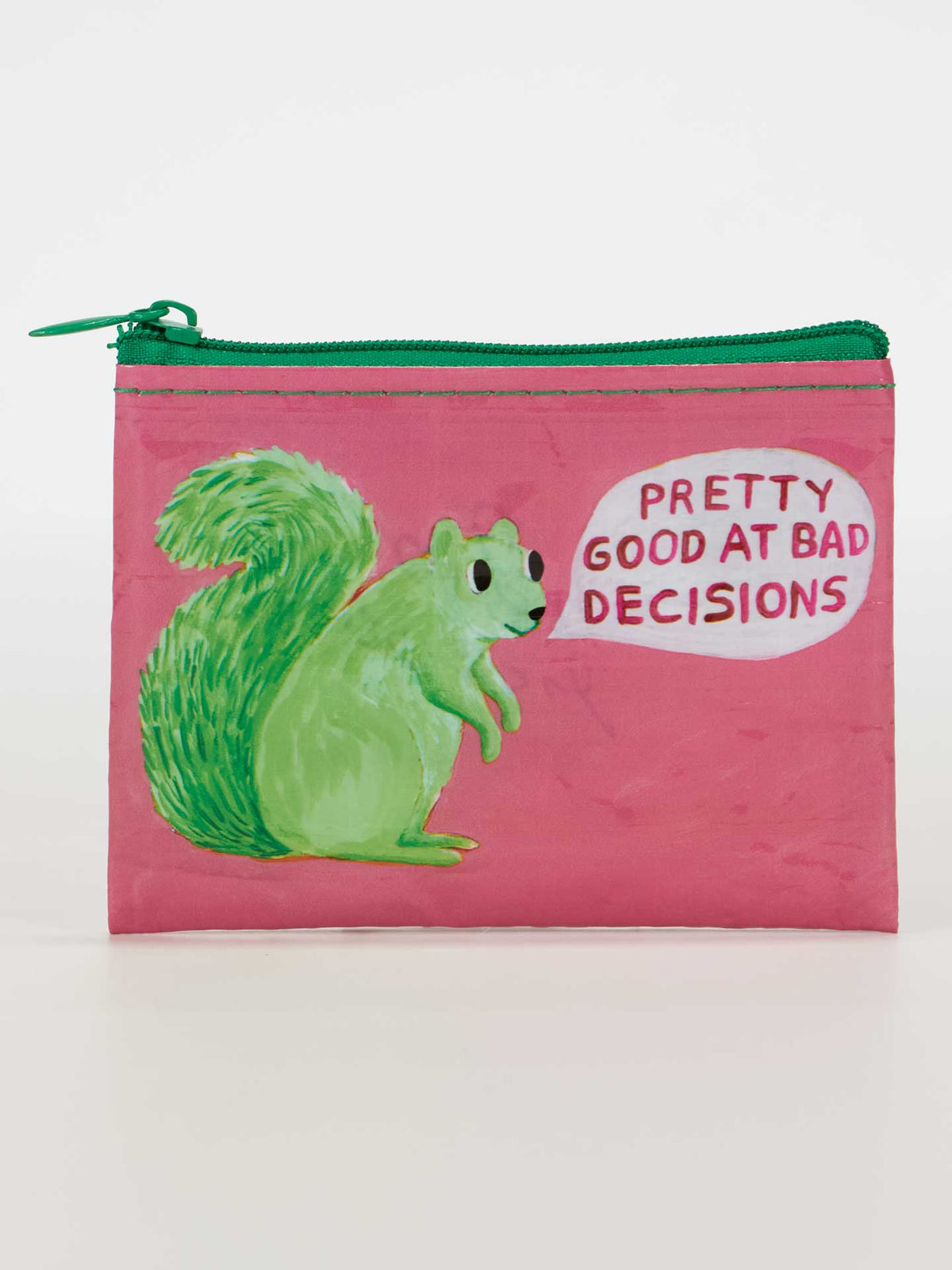 The Blue Q "Pretty Good At Bad Decisions" Coin Purse is a pink zipper pouch made from recycled material, featuring a green squirrel with the phrase “Pretty good at bad decisions” in a speech bubble.