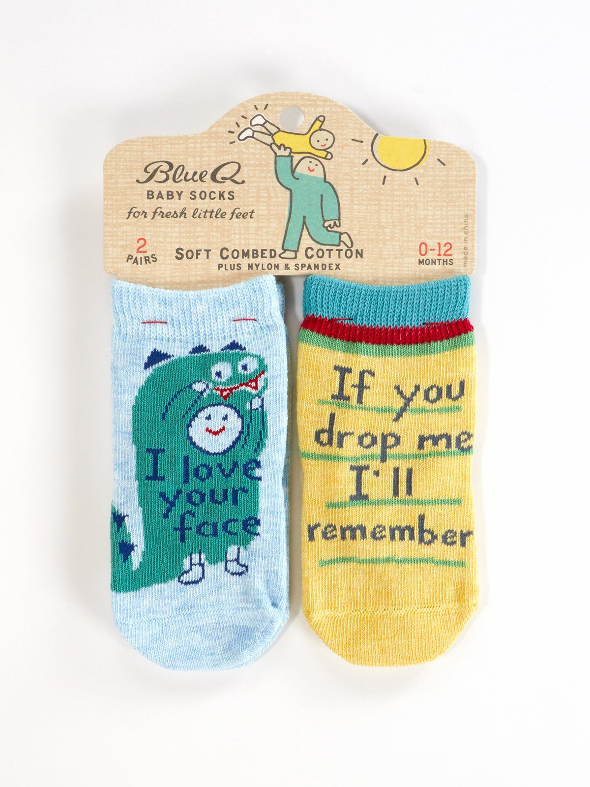 Blue Q’s "I Love Your Face/ If You Drop Me I’ll Remember" baby socks (0-12 months): one blue sock with a green monster and message, one yellow sock with trim and a reminder. Durable, comfy cotton for all-day wear.