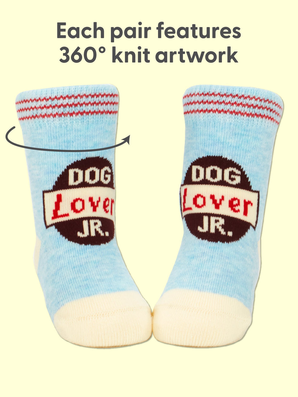 Sure! Here’s a revised version of the sentence using your product data: These Blue Q Dog Lover Jr./Itty Bitty Buddies Baby Socks come as a pair in light blue organic cotton, accented with red and white stripes at the top. They feature a circular “DOG Lover JR.” design and 360° knit artwork—perfect for little canine fans or matching pairs for best buddies.