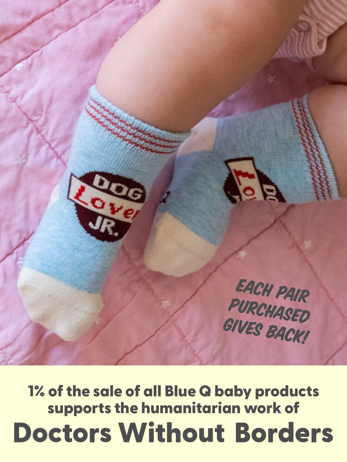 A baby sporting Blue Q’s Dog Lover Jr./ Itty Bitty Buddies organic cotton socks relaxes on a pink quilt, all set for playful adventures with their new buddies. With every pair purchased, 1% of Blue Q baby product sales supports Doctors Without Borders.